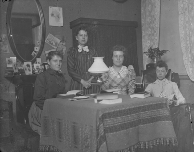4 women around a table