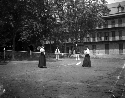men and women playing tennis