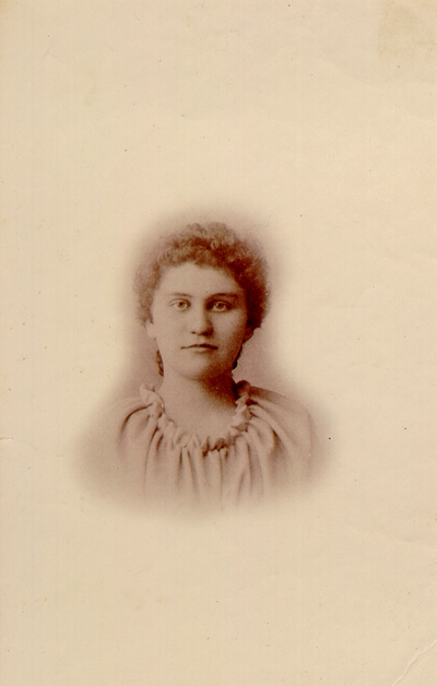 Young lady in normal clothing with curly hair