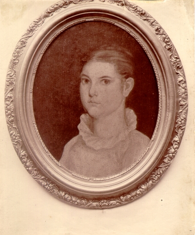 Photograph of oval framed portrait of young lady