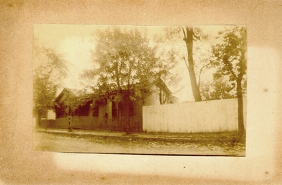 Small house off of street with woman on porch; Variant of #17 and #20