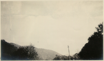 View of sky and hill below it