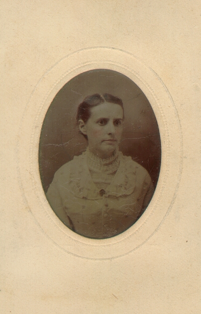 Mrs. M.C. Lyle wearing white dress