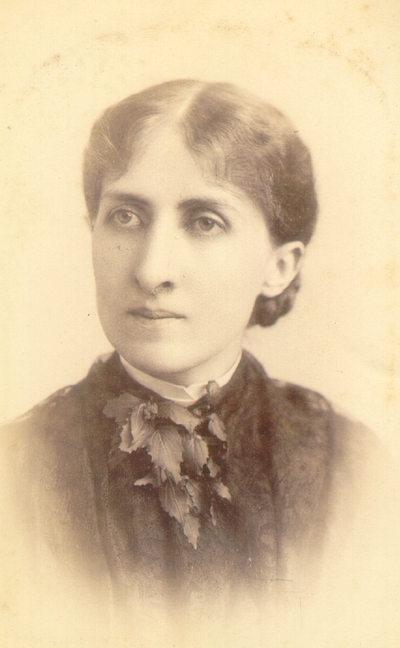 Young woman wearing dark dress with leaf collar; Western Female Seminary