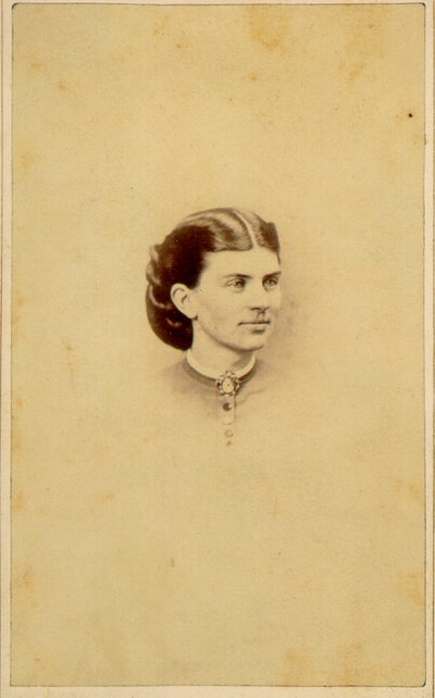 Young woman's face; Hair done up nicely