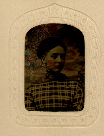 Lizzie A. Lyle in checkered dress
