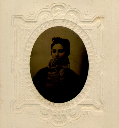 Woman with large bow around neck