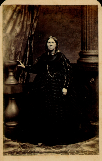 Large woman in dark dress