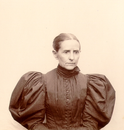 Mrs. M.C. Lyle in black dress