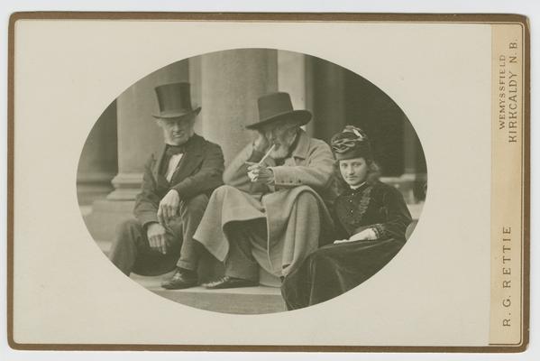 Cabinet photograph of Thomas Carlyle with his brother and niece