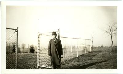 Samuel M. Wilson (1871-1946) by fence at Traveler's Rest