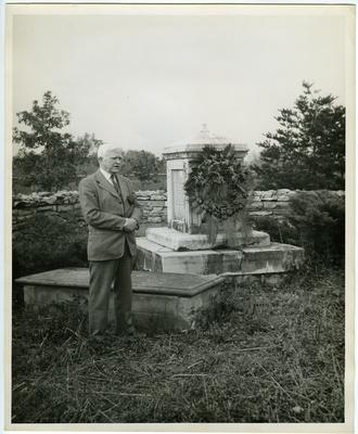 Samuel M. Wilson (1871-1946) by Governor Isaac Shelby's grave;                              Traveler's Rest burial ground. Oct. 12, 1944. KY. Soc. Sons of Rev. War of 1812 noted on back photo.                              Photo by Winston Coleman. Lexington, KY. Oct. 12 1944 printed on back photo