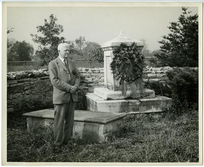 Samuel M. Wilson (1871-1946) by Governor Isaac Shelby's grave;                              Traveler's Rest burial ground. Oct. 1944. noted on back print.                              Photo by Winston Coleman. Lexington, KY. Oct. 12 1944 printed on back print
