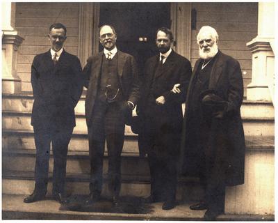 Charlton Hunt Morgan (1869-1934), C.S.A., Thomas Hunt Morgan (1866-1945), Alexander Graham Bell (1847 -1922), and Gilbert H. Grosvenor (1875-1966), standing outside of house