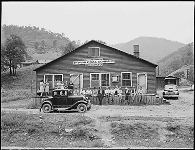 Miners and their families gather around the company store and office.  Lejunior, Harlan County, KY.9/12/46