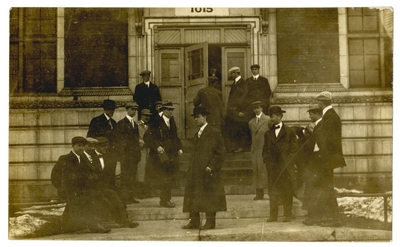 Group of men on steps
