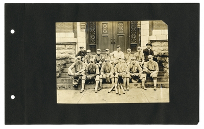 Group portrait: baseball team seated on steps