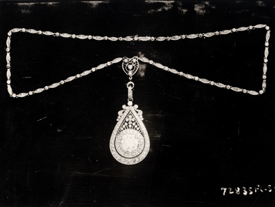 $2,000 diamond pendent, wedding gift of the House of Representatives to Miss Jessie Wilson