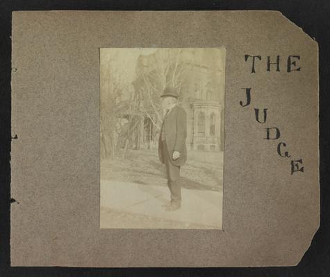 Handwritten title on album page: The Judge