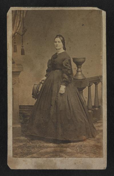 Portrait of unknown woman in long dress, photograph by W.R. Phipps