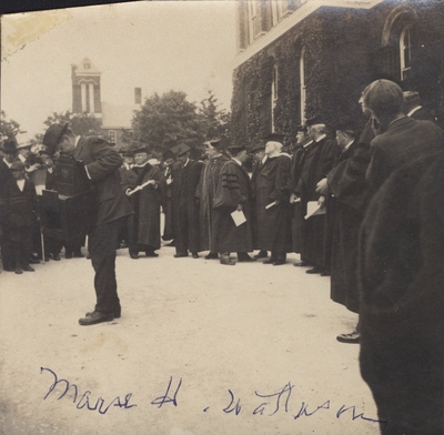 Presumed to be commencement (photographer in foreground)