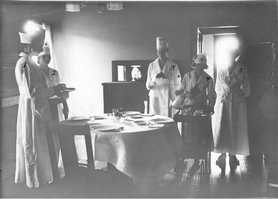 Women students setting a table