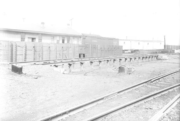 Buildings, railroad cars, plant buildings