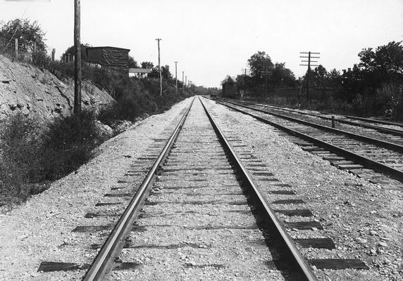 Railroad tracks with rock ledge