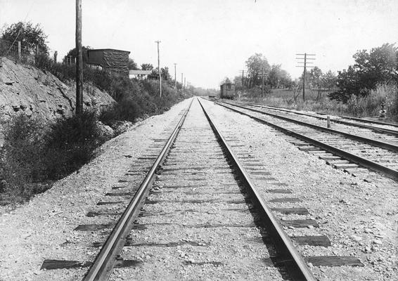 Railroad tracks with rock ledge