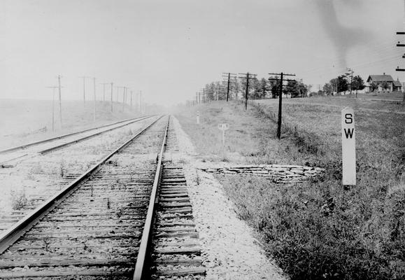 Railroad tracks with S W marker