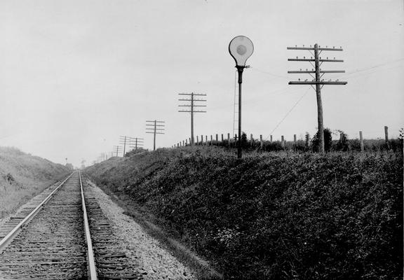 Railroad tracks with signal