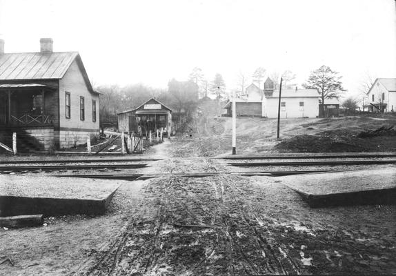 Tracks with railroad crossing sign