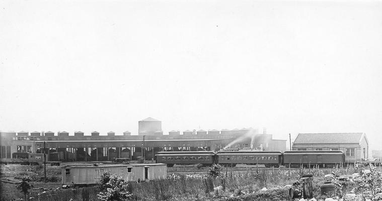 Train and box cars in loading station