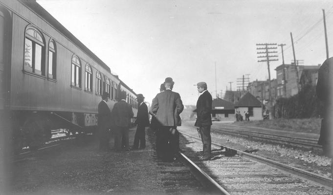 Passenger car on train tracks