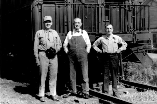 Three day trip to Blackey, Kentucky, courtesy of Louisville and Nashville Railroad, Neon?, Railroad Company furnished a private car, two cooks for these three persons interested in photography, right to left, J. Winston Coleman, Trimble McKee, 1903, Louis Edward Nollau, circa June 1947