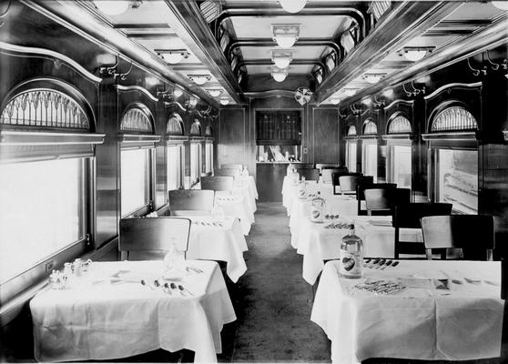 Dining car interior with table settings