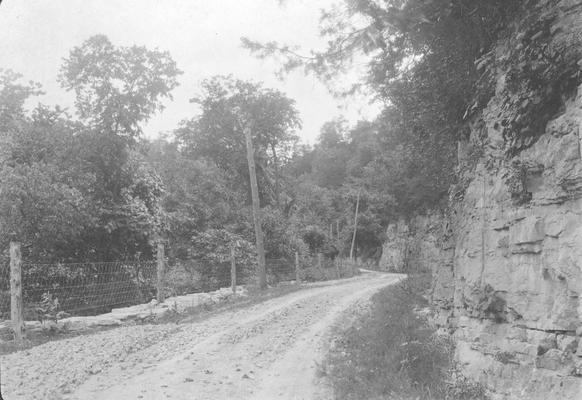 Gravel road through rural scene