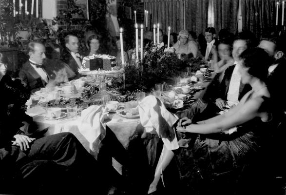 Virginia McVey, daughter of Frank and Mable Sawyer McVey and James Edward Morris, bride and groom at wedding party reception