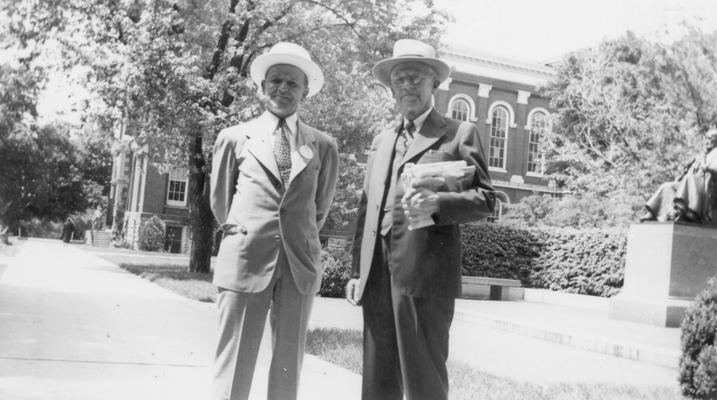 Gillis, Ezra L., Instructor in Normal / Education Department, 1907-1910, University Registrar, 1913-1937, Director of Bureau of Source Materials in Higher Education, 1937-1956, First University Archivist, right, with Stanley Ridd, print dated circa, 1941