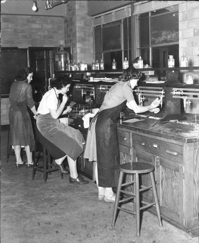 Foods laboratory with women students working