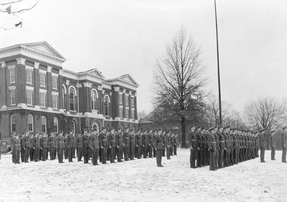 Administration Building, cadet formation in snow, circa 1940