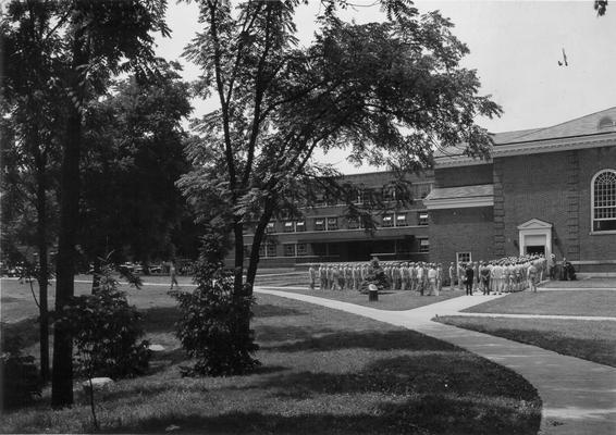 Soldiers entering Memorial Hall, Erikson Hall in background