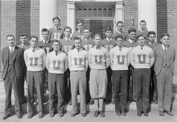 Group of young men wearing University High letter sweaters