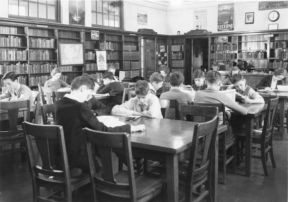 Students reading in University High library