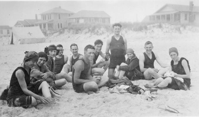 Group of young men and women in bathing suits, Long Beach, New York trip