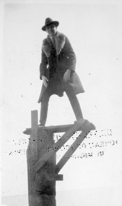 Bill Wallace on the end of the pier, senior trip to Chicago, Illinois, Spring 1920