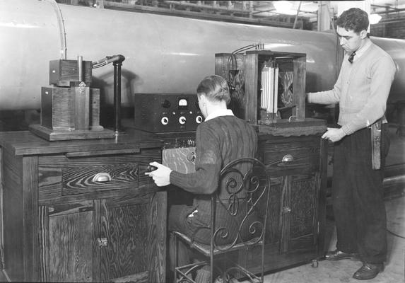 Two students with equipment