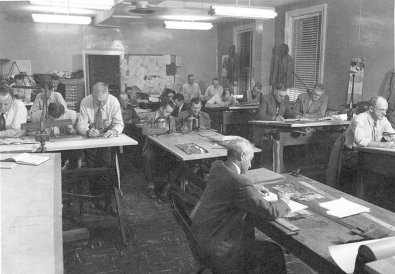 Professors and students in drafting class