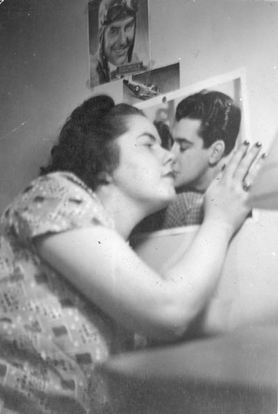 Woman student kissing poster, page 26, 1939 