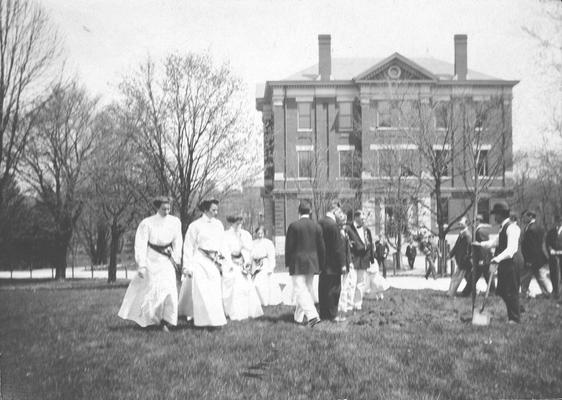 Men and women planting trees, Arbor Day in front of Miller Hall, circa 1890